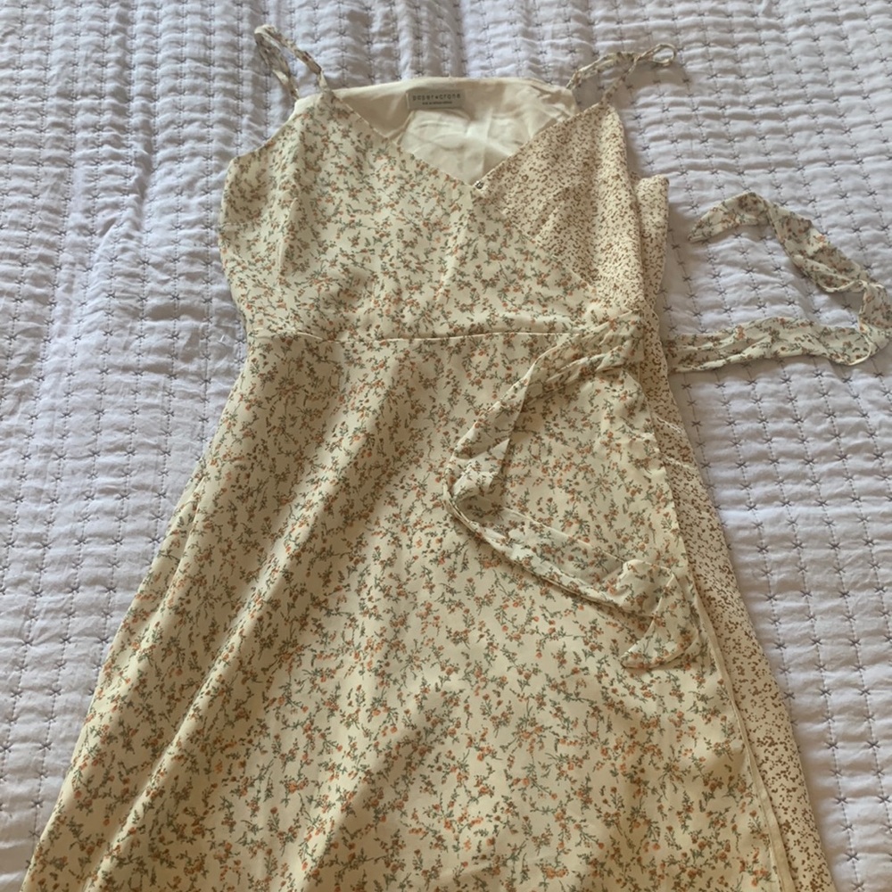 A floral dress with waist tie belt